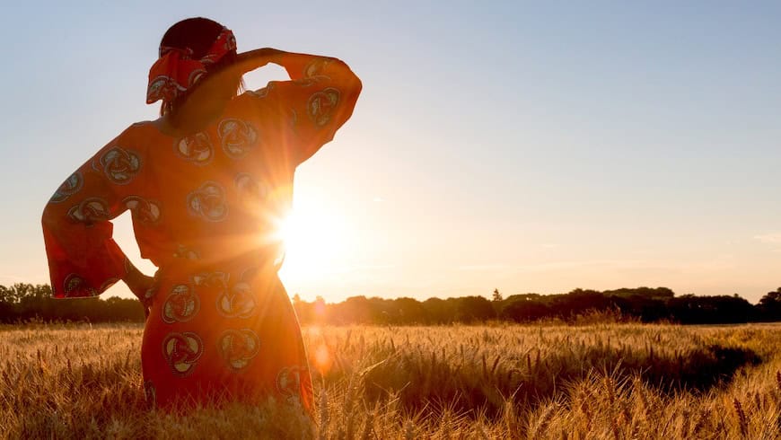 African woman at sunrise