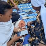 Creating a Local Means of Exchange for African Entrepreneurs: How a Blockchain-Based Community Currency Gained Traction in Tanzania
