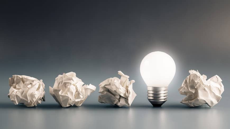 Crumpled paper and lightbulb