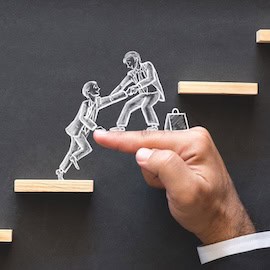 Image of businesspeople climbing up platform