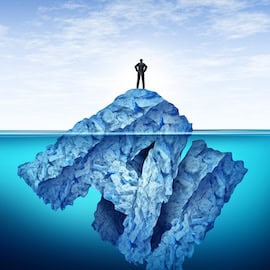 Image showing man standing on a submerged iceberg shaped like the letters AI