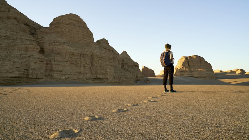 Hiker in desert valley