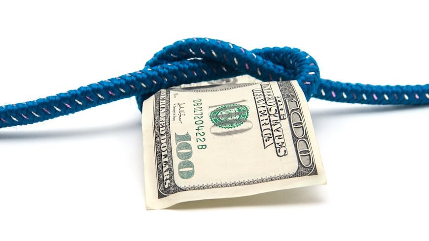 $100 bill tied up with a rope