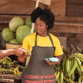 Woman making financial transaction