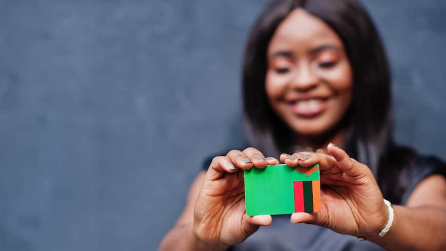 https://www.istockphoto.com/photo/african-woman-hold-small-zambia-flag-in-hands-gm1281227278-379318691