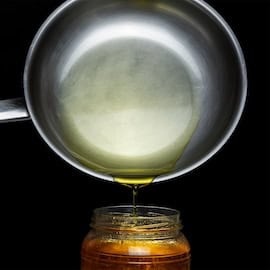 https://www.istockphoto.com/photo/recycling-homemade-oil-from-a-frying-pan-gm1419804122-466032496