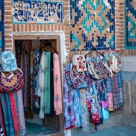 https://www.istockphoto.com/photo/traditional-souvenir-shop-selling-colorful-cloth-and-scarf-outside-gm1481348740-508671863