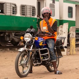 https://www.istockphoto.com/photo/motorbike-taxi-stationed-at-train-station-awaiting-passengers-gm1629625566-532386300