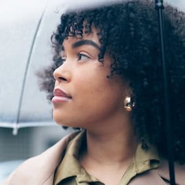 https://www.istockphoto.com/photo/woman-rain-and-thinking-outdoor-with-umbrella-for-face-weather-and-safety-with-gm1917072866-555123429