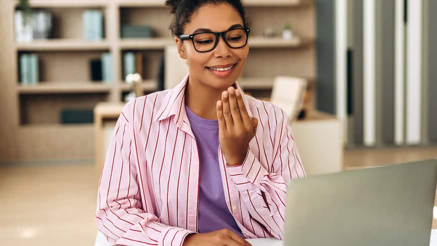 https://www.istockphoto.com/photo/smiling-businesswoman-having-video-call-and-using-sign-language-at-office-gm2194199830-612380307