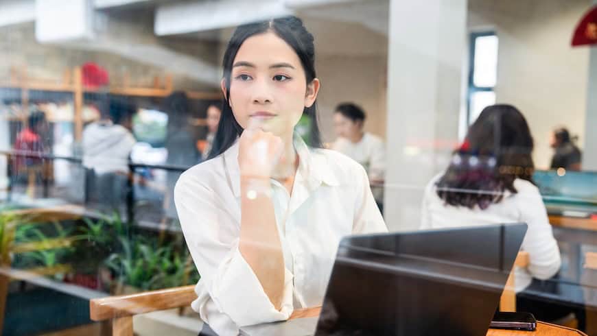 Photo credit: :Tran Van Quyet / https://www.istockphoto.com/photo/thoughtful-woman-works-on-laptop-in-cafe-reflecting-city-life-through-the-glass-gm2212881927-629793149