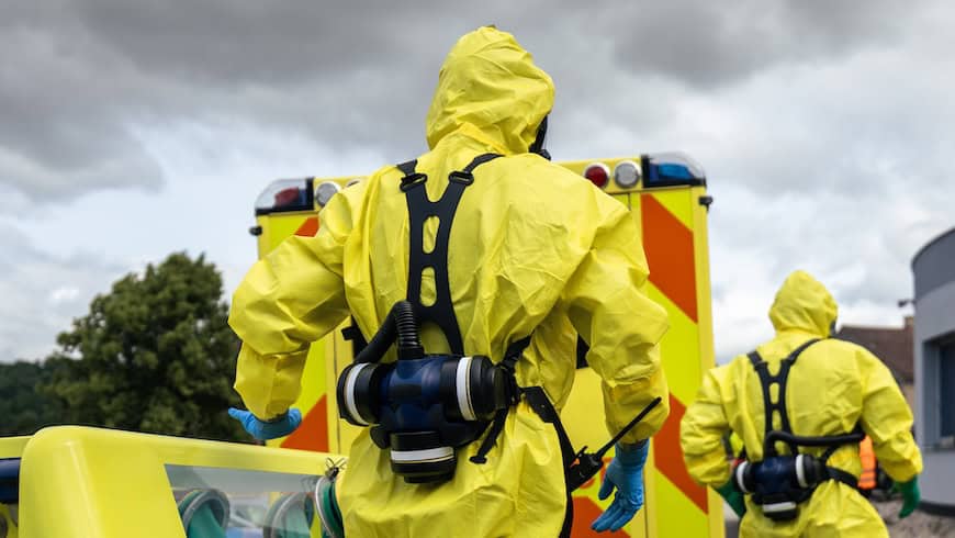https://www.istockphoto.com/photo/biohazard-team-of-emergency-medical-service-in-protective-suits-gm2219789633-636262679