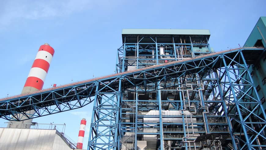 https://www.istockphoto.com/photo/power-plant-showcases-intricate-blue-steel-infrastructure-with-striped-chimney-stacks-gm2249225342-663017066