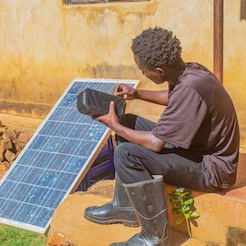 https://www.istockphoto.com/photo/young-man-tuning-portable-radio-powered-by-solar-panel-mzimba-malawi-%C3%A2-medium-shot-gm2273506075-685868790