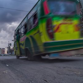 Photo purchased on iStock / https://www.istockphoto.com/photo/colorful-bus-in-nairobi-capital-city-of-kenya-gm670563828-122649155